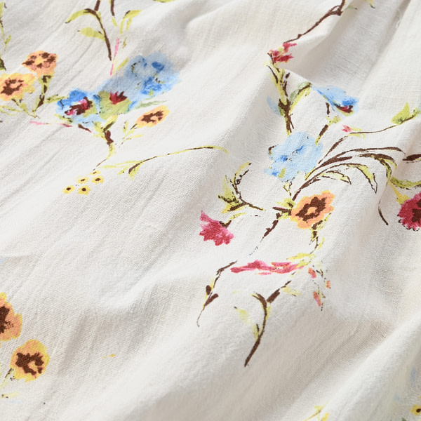Indian Khadi Next to Spring Print Gathered Dress Detail