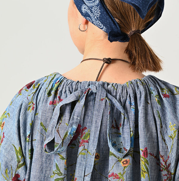 Indian Khadi Dungaree Next to Spring Print Gathered Dress Detail