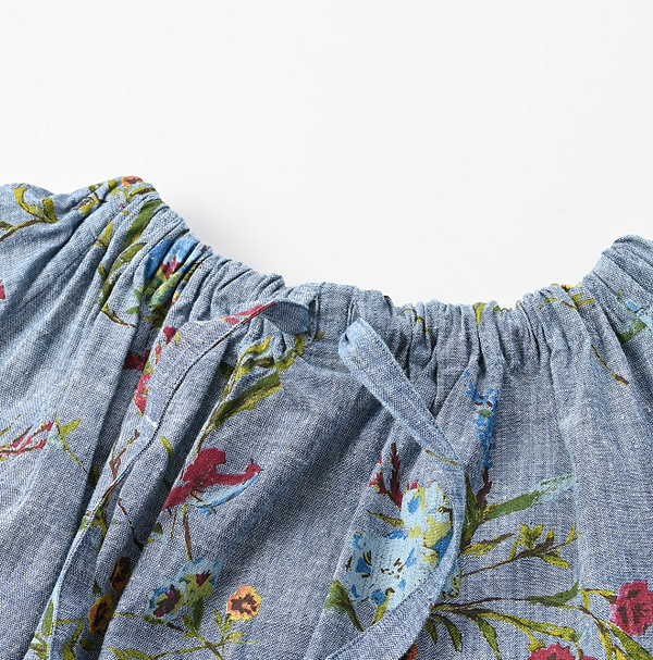 Indian Khadi Dungaree Next to Spring Print Gathered Dress Detail