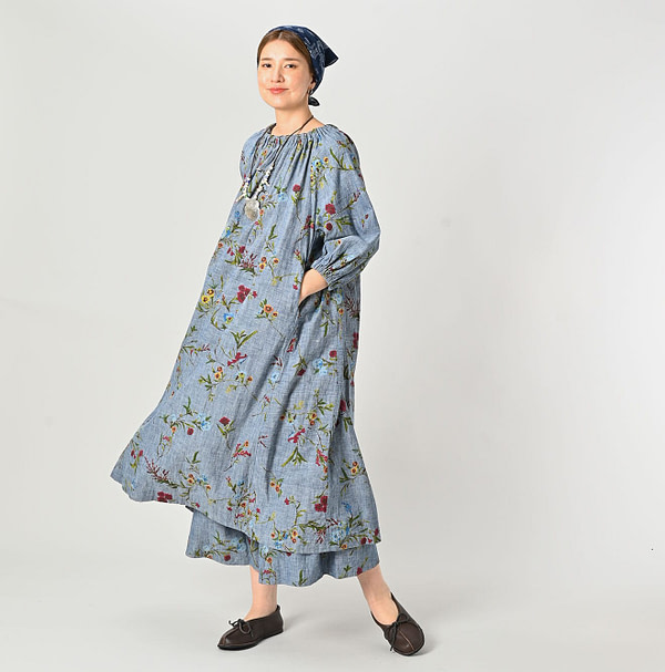 Indian Khadi Dungaree Next to Spring Print Gathered Dress Female Model