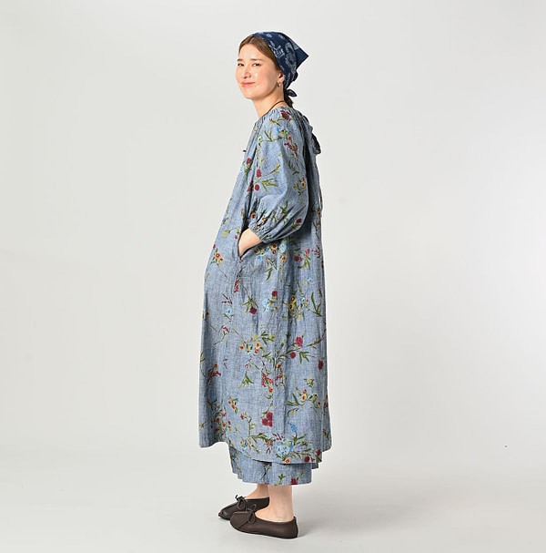 Indian Khadi Dungaree Next to Spring Print Gathered Dress Female Model