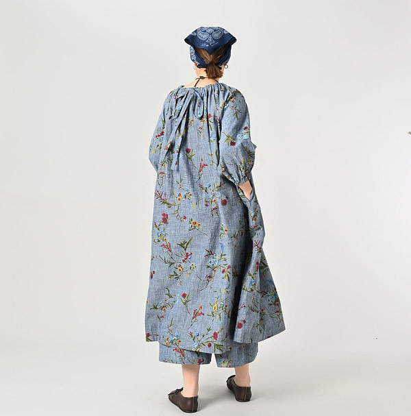 Indian Khadi Dungaree Next to Spring Print Gathered Dress Female Model