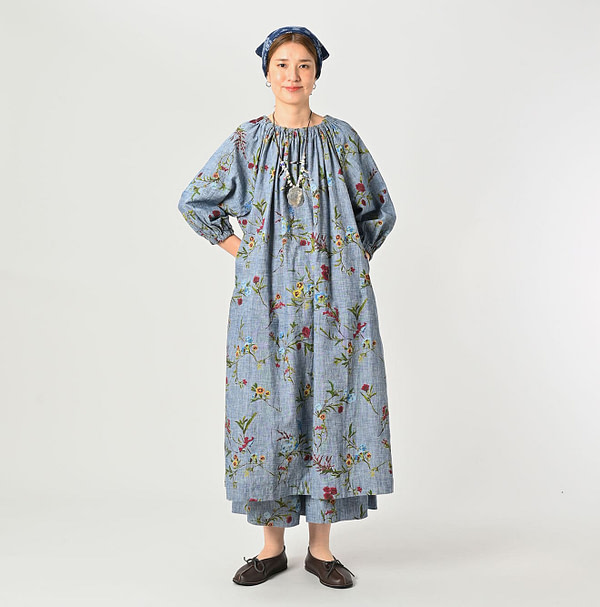 Indian Khadi Dungaree Next to Spring Print Gathered Dress Female Model