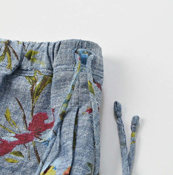 Indian Khadi Dungaree Next to Spring Print Rapper Pants Detail